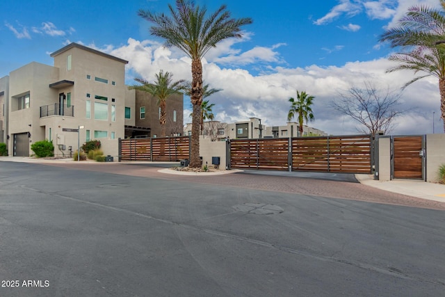 exterior space featuring fence and a residential view