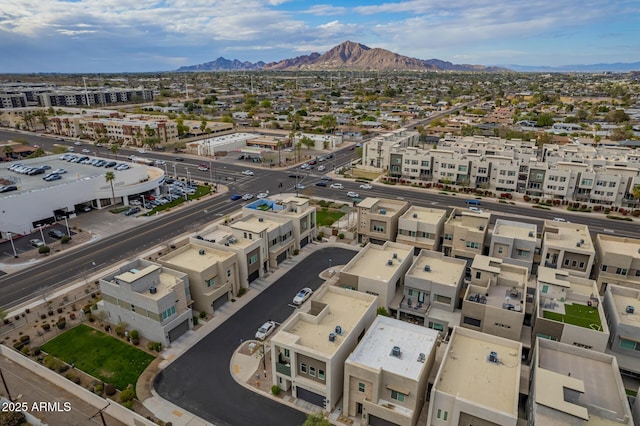 birds eye view of property featuring a mountain view