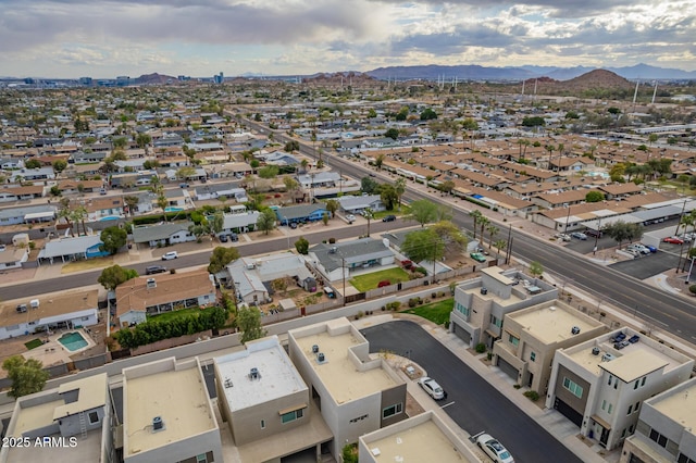 birds eye view of property featuring a residential view and a mountain view