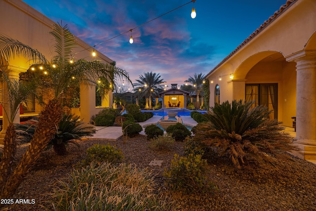 10894 E Turquoise Ave, Scottsdale, AZ 85259 - view of yard featuring an outdoor pool and a patio area