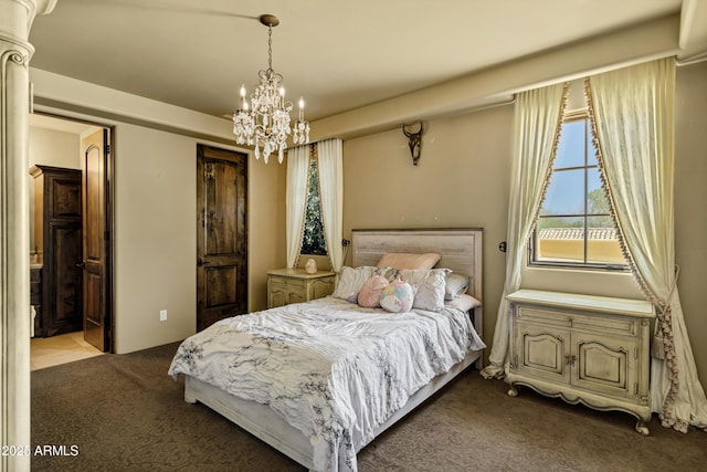 10894 E Turquoise Ave, Scottsdale, AZ 85259 - bedroom featuring carpet and a chandelier