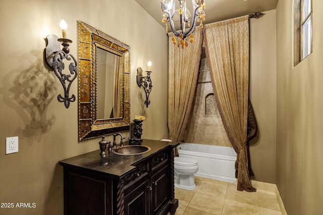 10894 E Turquoise Ave, Scottsdale, AZ 85259 - bathroom with baseboards, a chandelier, toilet, tile patterned floors, and vanity