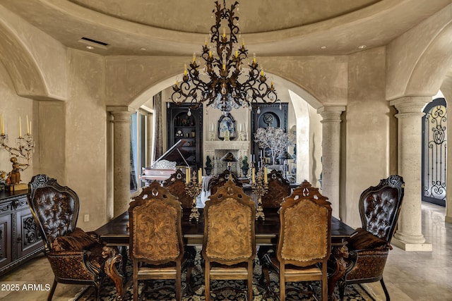 10894 E Turquoise Ave, Scottsdale, AZ 85259 - dining area featuring arched walkways, a high ceiling, and decorative columns