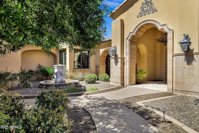 10894 E Turquoise Ave, Scottsdale, AZ 85259 - doorway to property featuring stucco siding