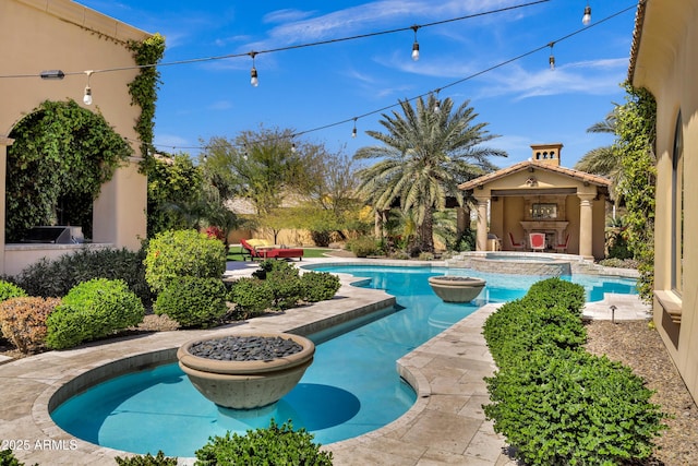 10894 E Turquoise Ave, Scottsdale, AZ 85259 - view of swimming pool featuring a pool with connected hot tub and a patio