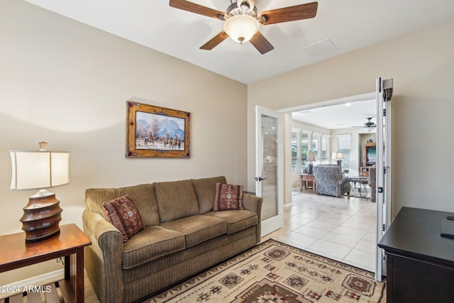 tiled living room with french doors