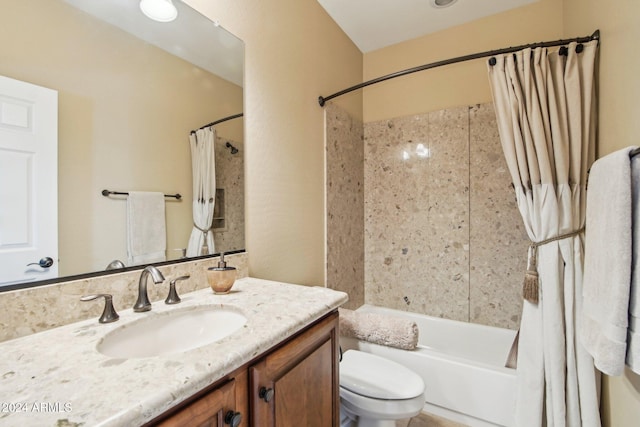 full bathroom with vanity, toilet, and shower / bath combo