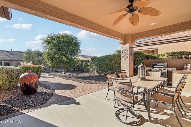 view of patio / terrace featuring ceiling fan