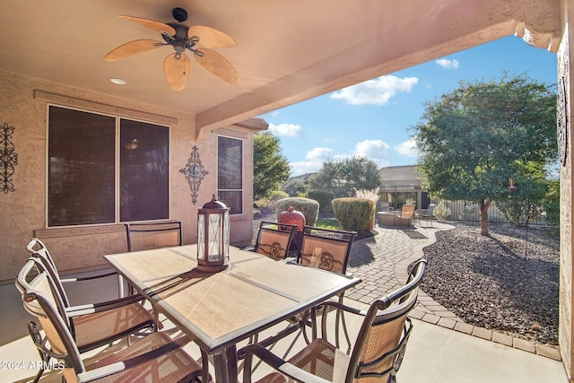 view of patio featuring ceiling fan