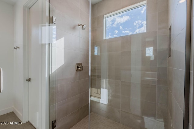 bathroom featuring an enclosed shower