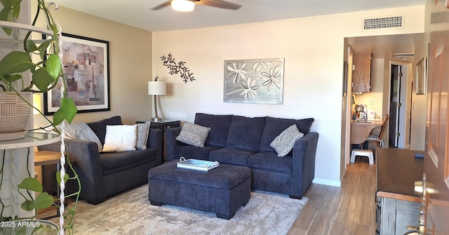 2064 S Farnsworth Dr Unit 38, Mesa, AZ 85209 - living room with a ceiling fan and wood finished floors