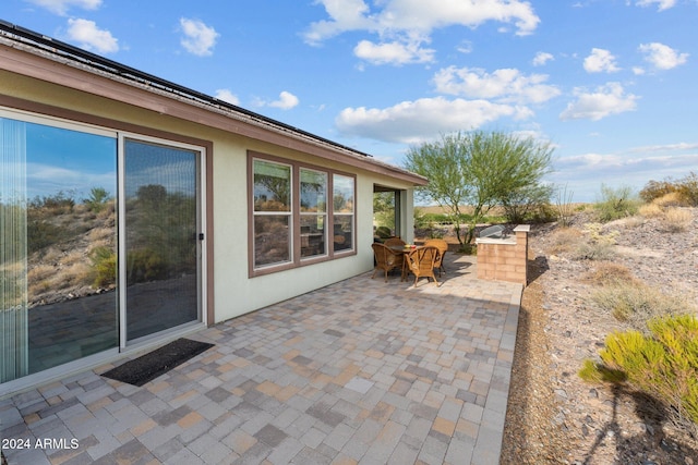 view of patio with outdoor dining area