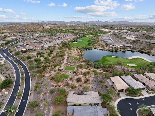 bird's eye view featuring golf course view, a residential view, and a water and mountain view