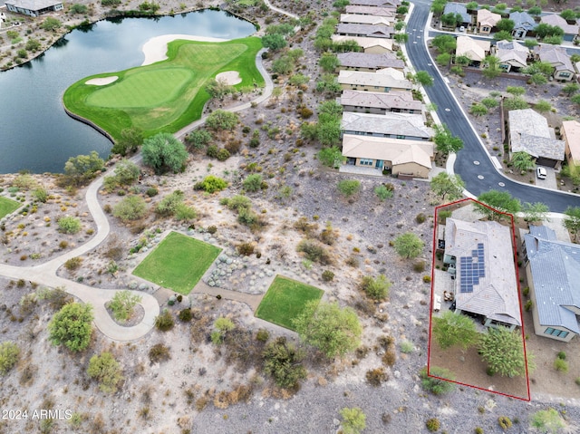 aerial view with a water view, a residential view, and golf course view