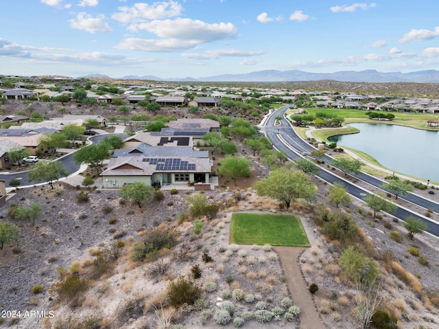 aerial view featuring a residential view and a water and mountain view