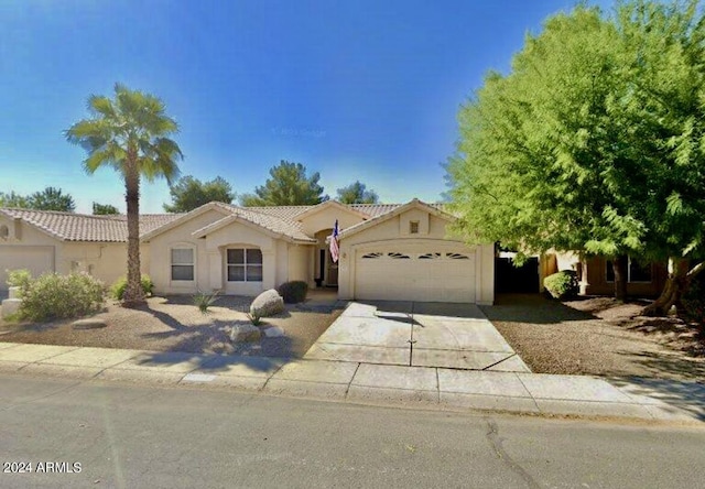 view of front of house with a garage