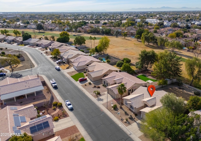 birds eye view of property featuring a mountain view