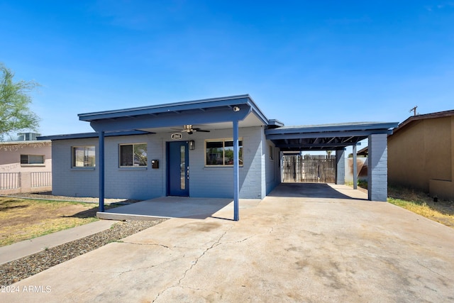 view of front of home with a carport