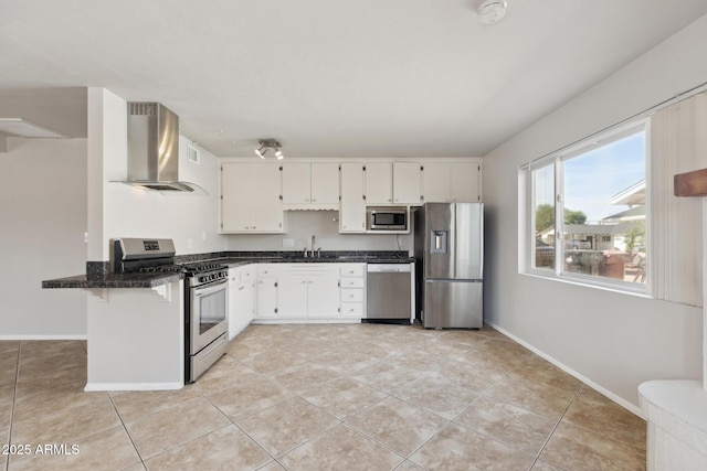 8301 E Indianola Ave, Scottsdale, AZ 85251 - kitchen with appliances with stainless steel finishes, wall chimney range hood, baseboards, and light tile patterned flooring