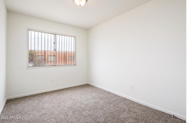 empty room with carpet floors