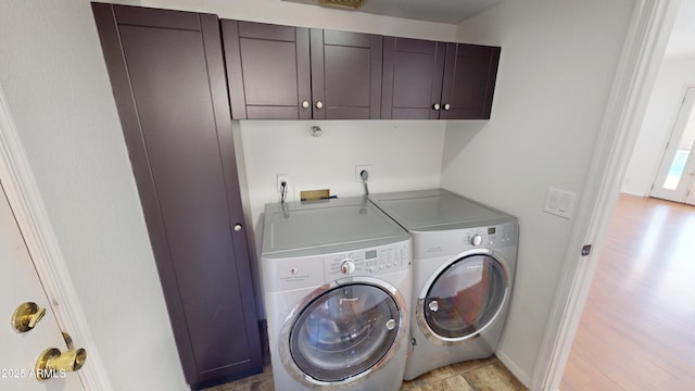 8541 W Pershing Ave, Peoria, AZ 85381 - laundry area featuring cabinet space and washer and dryer