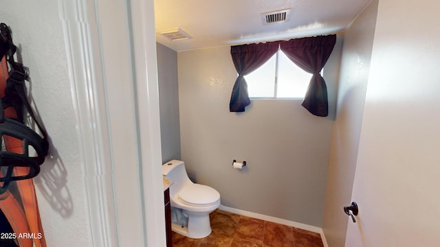 8541 W Pershing Ave, Peoria, AZ 85381 - bathroom featuring toilet and baseboards