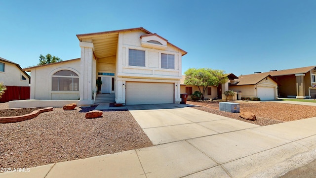 8541 W Pershing Ave, Peoria, AZ 85381 - view of front of house featuring an attached garage, driveway, and stucco siding
