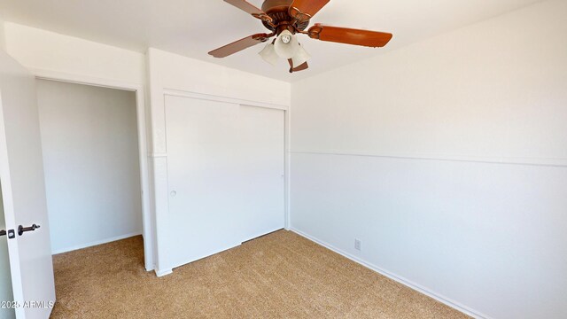 8541 W Pershing Ave, Peoria, AZ 85381 - unfurnished bedroom featuring light colored carpet, a closet, and ceiling fan