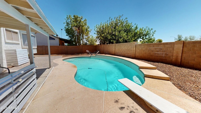 8541 W Pershing Ave, Peoria, AZ 85381 - view of pool featuring a fenced backyard, a diving board, and a patio area