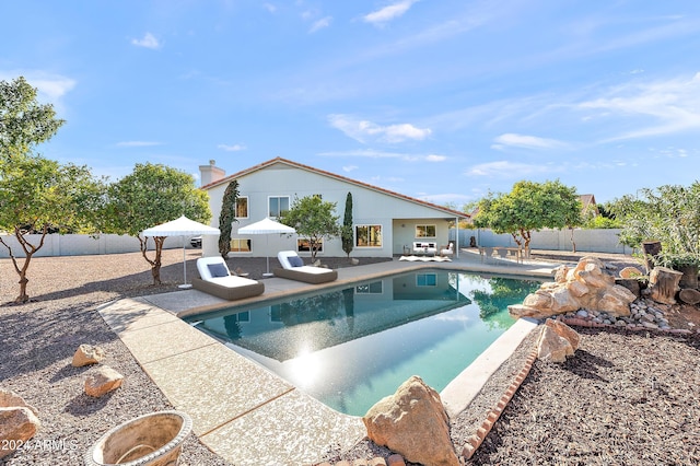 view of swimming pool featuring a patio