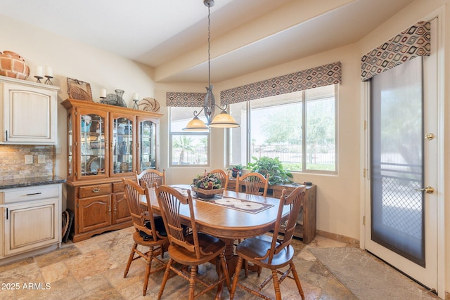 6931 S Four Peaks Way, Chandler, AZ 85249 - dining space with light stone finish floors and healthy amount of natural light