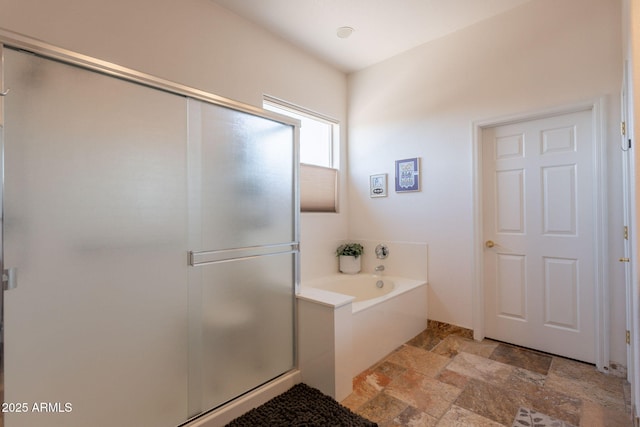 6931 S Four Peaks Way, Chandler, AZ 85249 - full bath featuring a garden tub, stone tile floors, and a stall shower