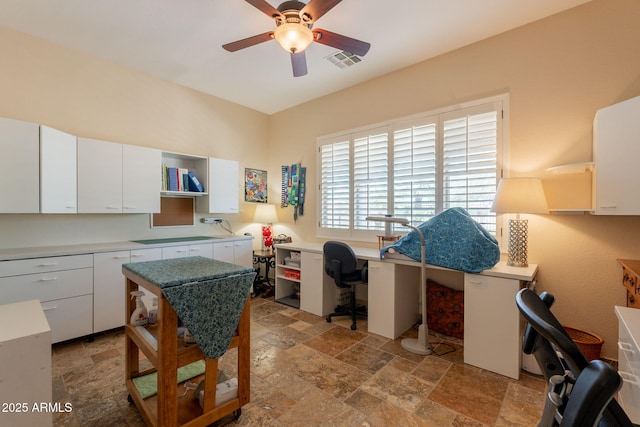 6931 S Four Peaks Way, Chandler, AZ 85249 - office area with stone tile flooring and a ceiling fan