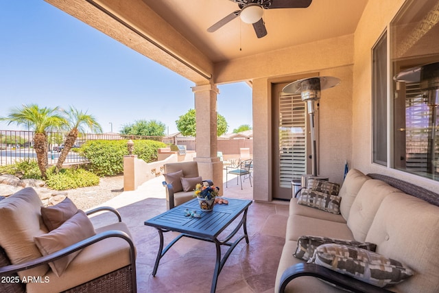 6931 S Four Peaks Way, Chandler, AZ 85249 - fenced backyard with outdoor lounge area, a patio area, and a ceiling fan