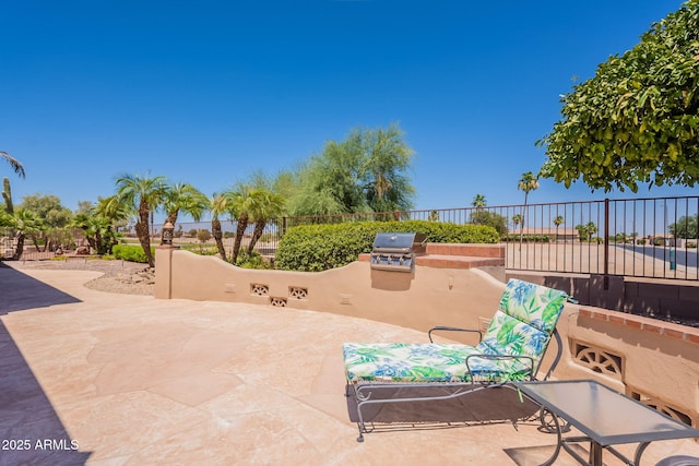 6931 S Four Peaks Way, Chandler, AZ 85249 - view of patio / terrace with an outdoor kitchen