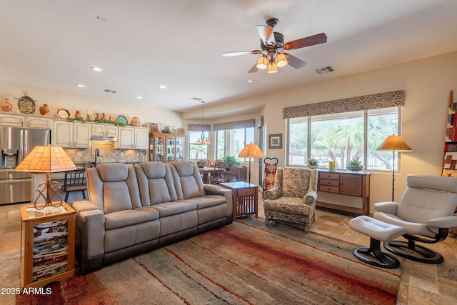 6931 S Four Peaks Way, Chandler, AZ 85249 - living area featuring a ceiling fan and recessed lighting