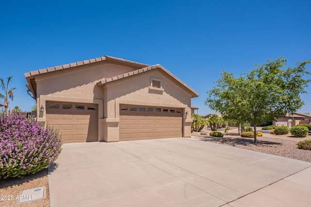 6931 S Four Peaks Way, Chandler, AZ 85249 - view of front of home featuring a garage, stucco siding, and concrete driveway