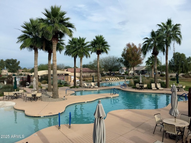 6931 S Four Peaks Way, Chandler, AZ 85249 - community pool featuring a patio