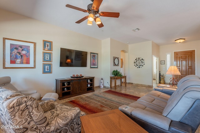 6931 S Four Peaks Way, Chandler, AZ 85249 - living room featuring a ceiling fan and arched walkways