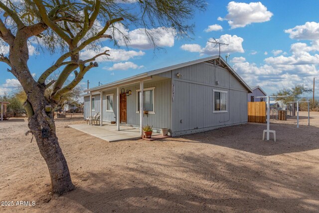 rear view of house featuring a patio