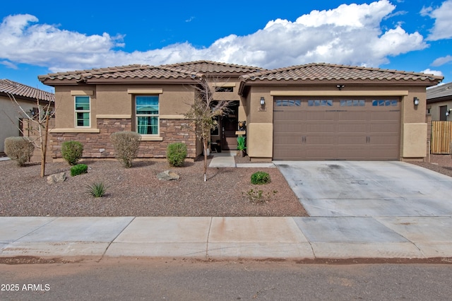 mediterranean / spanish-style house featuring a garage