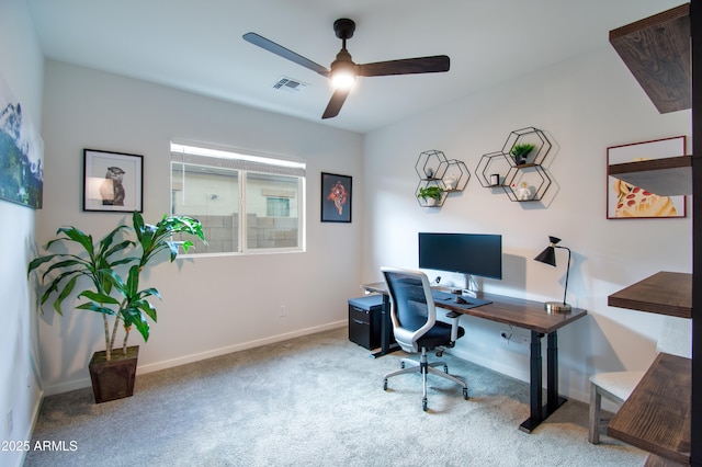 office area with ceiling fan and carpet