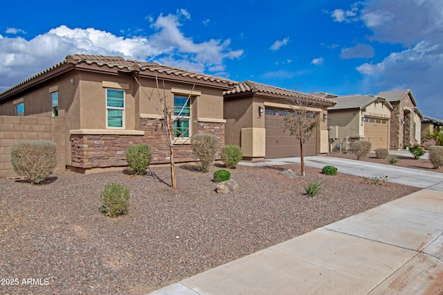 view of front of property featuring a garage