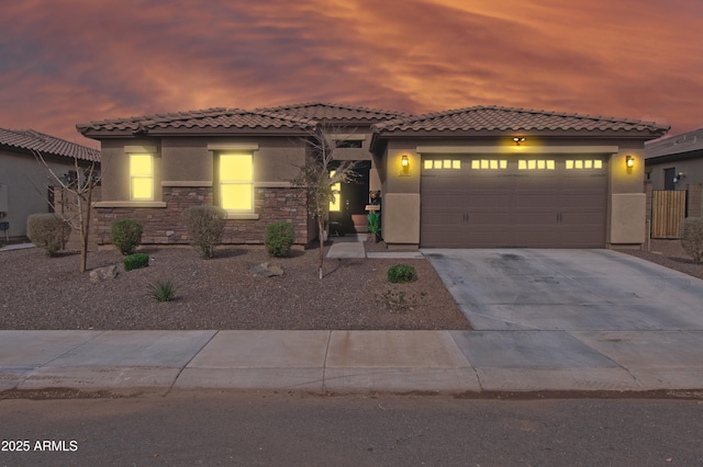 view of front of home with a garage