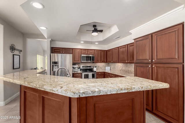 3581 W Ironwood Dr, Chandler, AZ 85226 - kitchen featuring appliances with stainless steel finishes, light tile patterned floors, a ceiling fan, decorative backsplash, and recessed lighting
