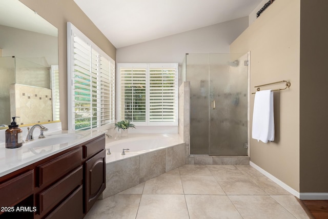 3581 W Ironwood Dr, Chandler, AZ 85226 - bathroom with a stall shower, vanity, a garden tub, lofted ceiling, and tile patterned flooring