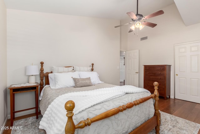 3581 W Ironwood Dr, Chandler, AZ 85226 - bedroom with wood finished floors, high vaulted ceiling, baseboards, and ceiling fan