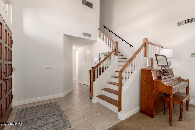 3581 W Ironwood Dr, Chandler, AZ 85226 - staircase featuring a high ceiling and baseboards