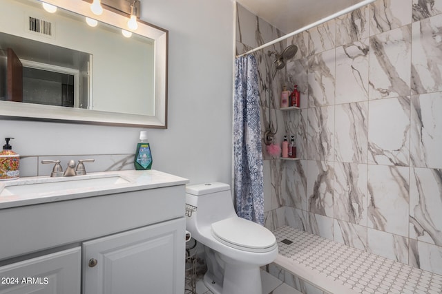 bathroom with vanity, toilet, and walk in shower