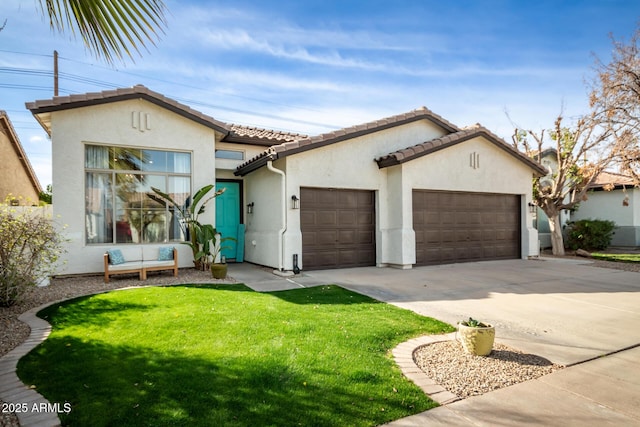 view of front of house with a garage and a front lawn